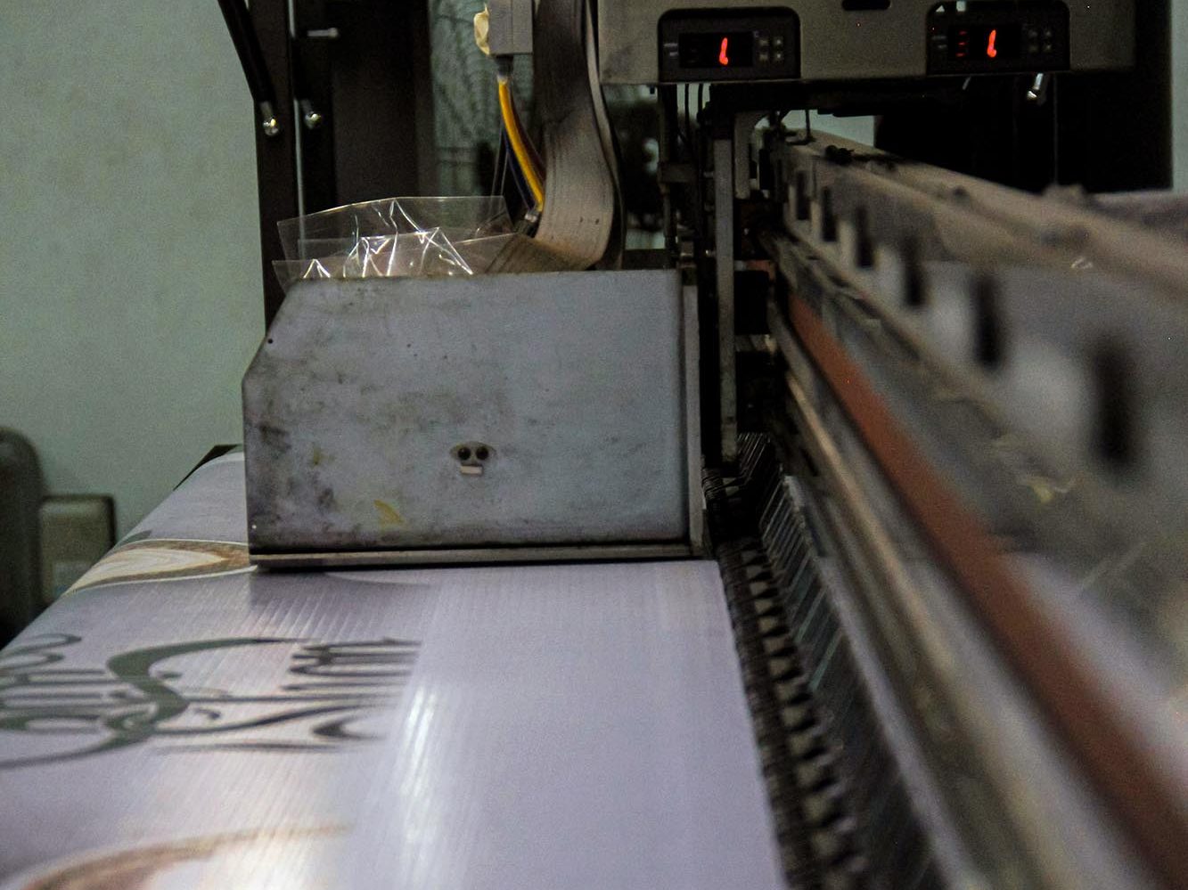 Photo by Geri Sakti on Unsplash close up of blurry printed image showing visible pixel softness